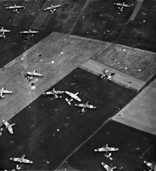 British Horsa gliders litter the fields northeast of Caen on the morning of D-Day - 6 June 1944