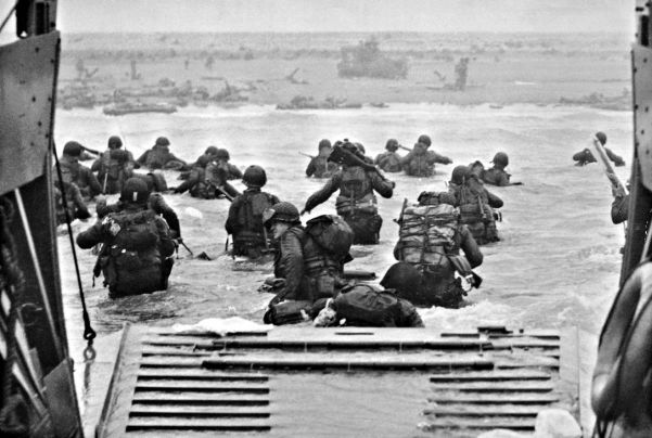Soldiers of the US 4th Infantry Division wade ashore under fire at Utah Beach on D-Day, the invasion of Northern France